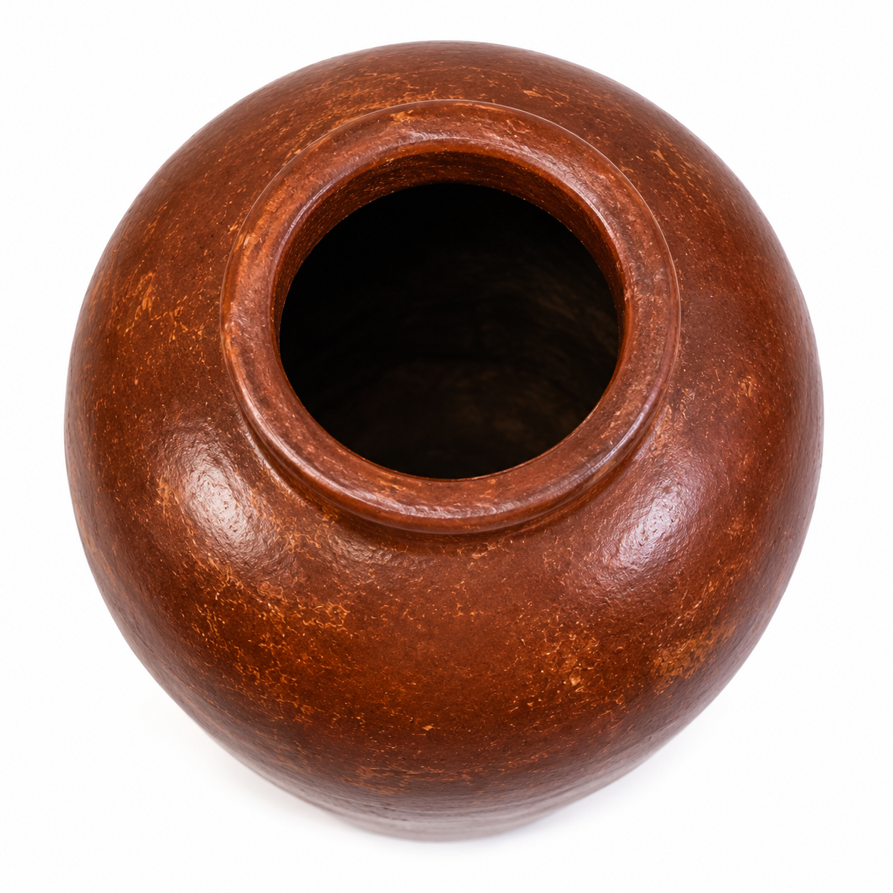 A round brown ceramic pot with a wide opening, shown from a top-down perspective on a white background.